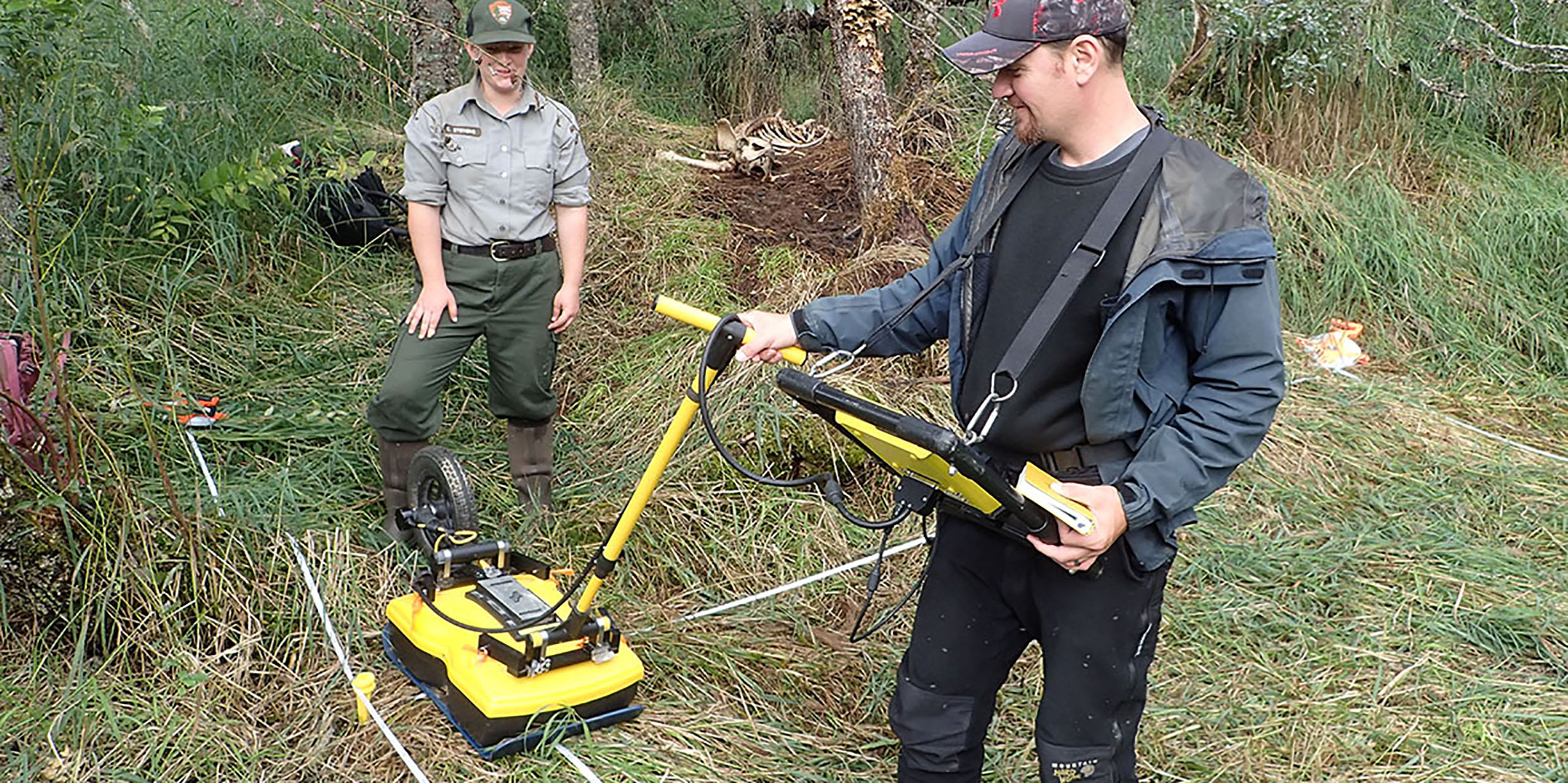 Image of archaeologist using ground penetrating radar