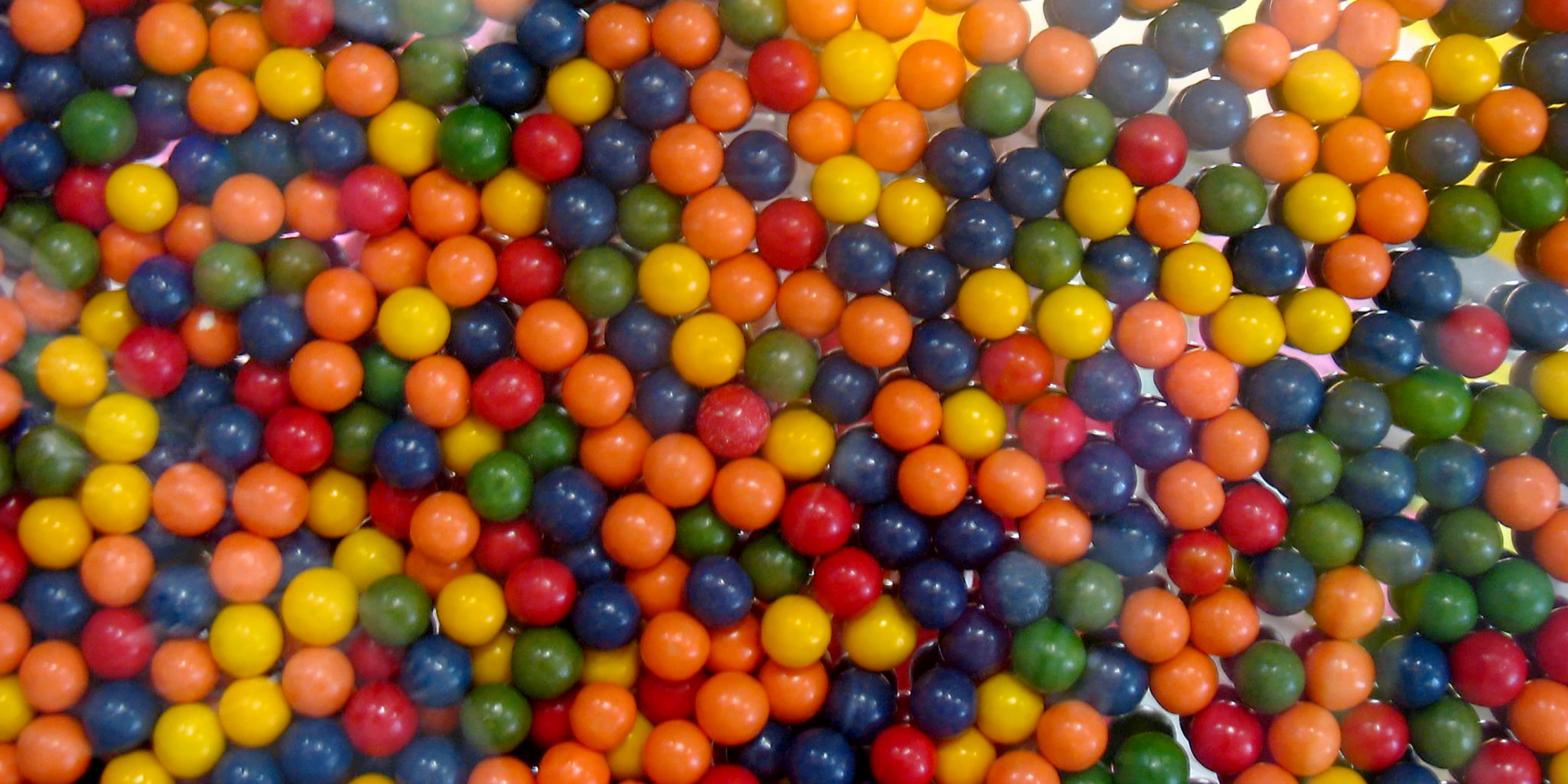 Image of gumballs packed together