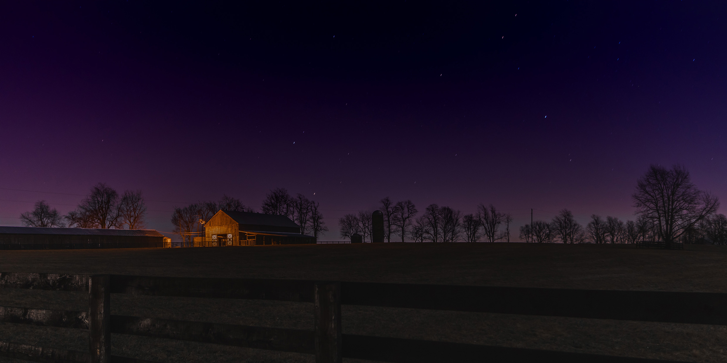 Image of a farm at night