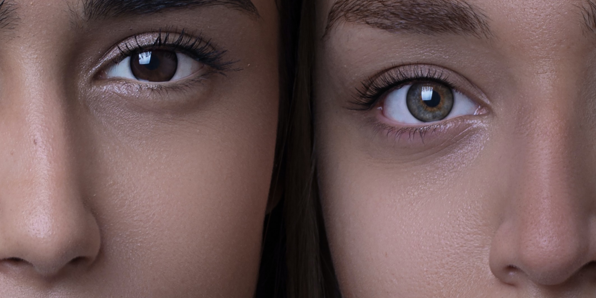 Close-up image of the faces of two women