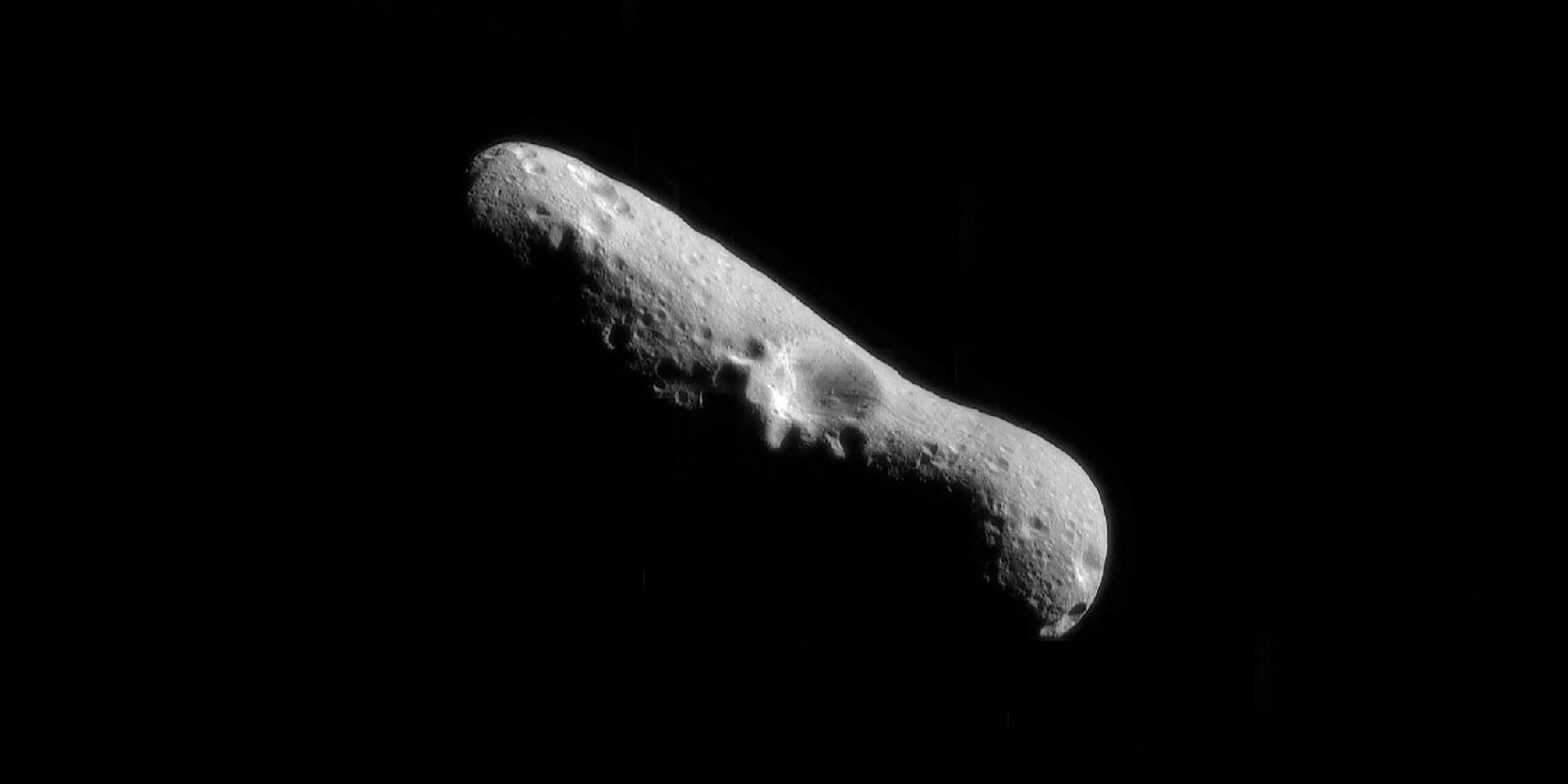 Image of a gray dusty asteroid in space