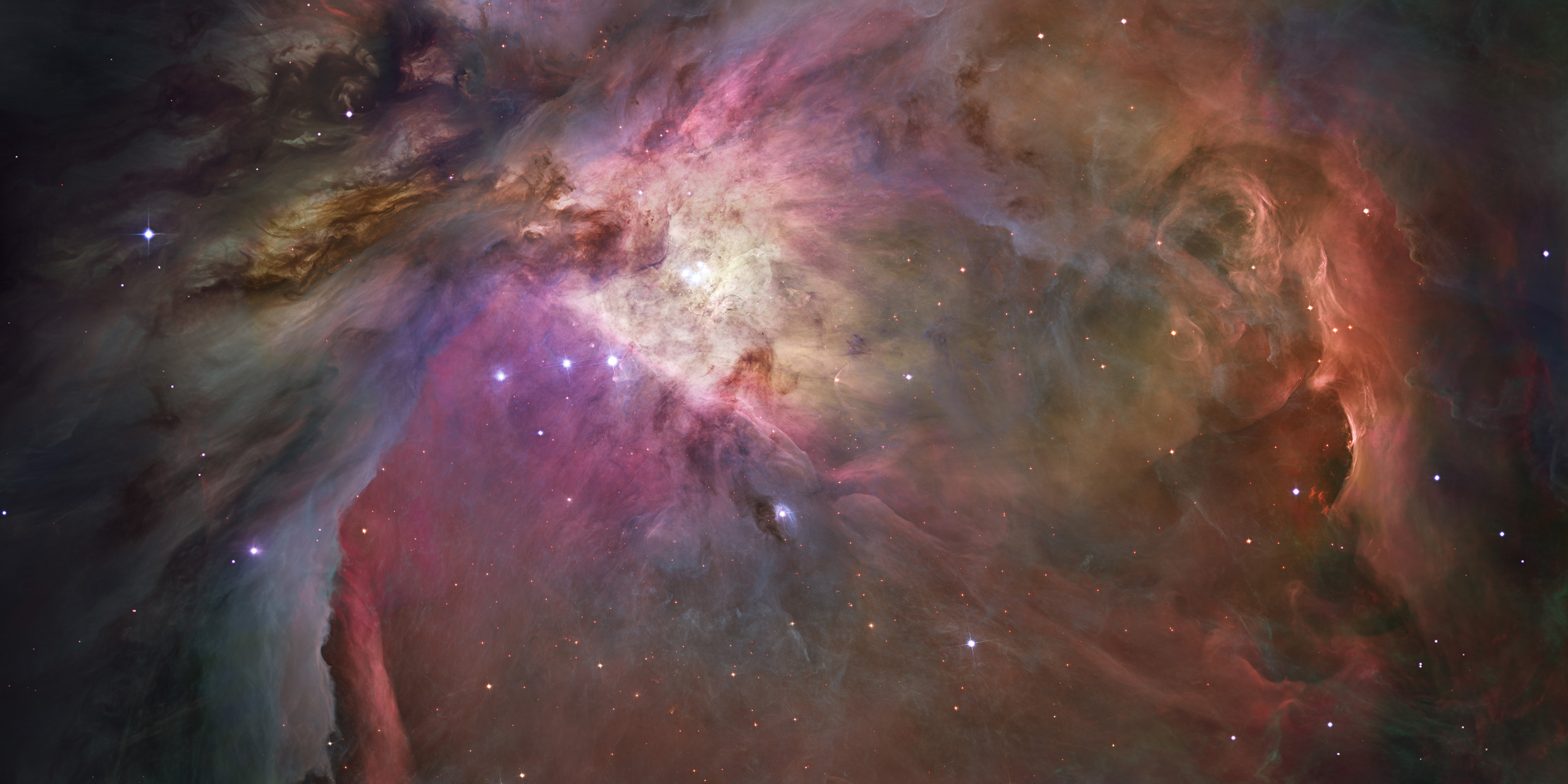 Astronomical image of a multi-colored nebula