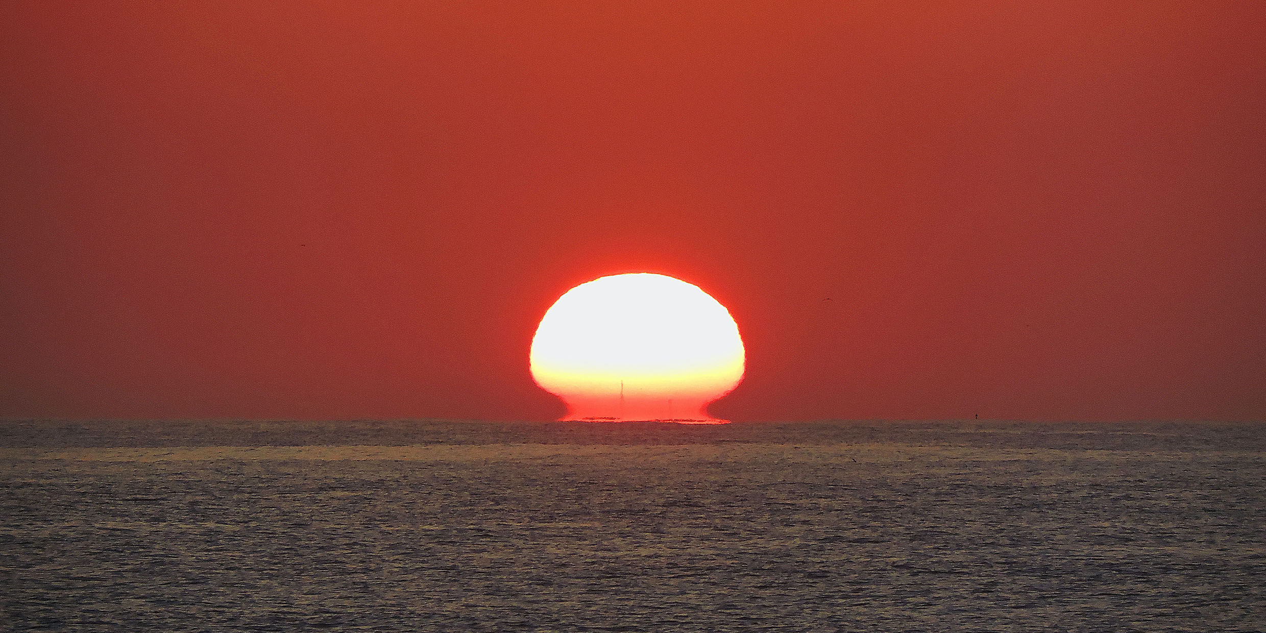 Image of a sunset over the ocean